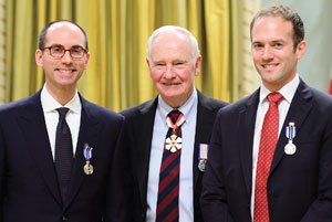 Governor General David Johnston, centre, presented the Meritorious Service Medal (Civil Division) to Owen Rees, left, and Grégoire Webber, at Rideau Hall last December in recognition of their work in launching the Supreme Court Advocacy Institute.